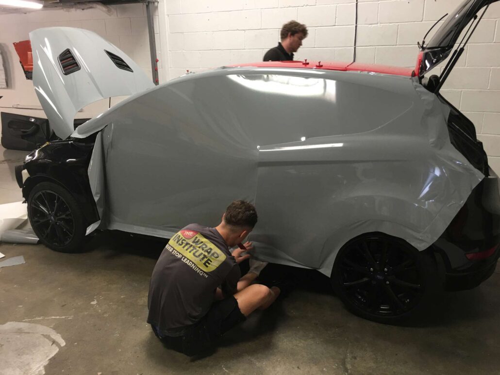 FORD FIESTA 2 - Prestige Graphics Kent Process of adding grey wrap on car