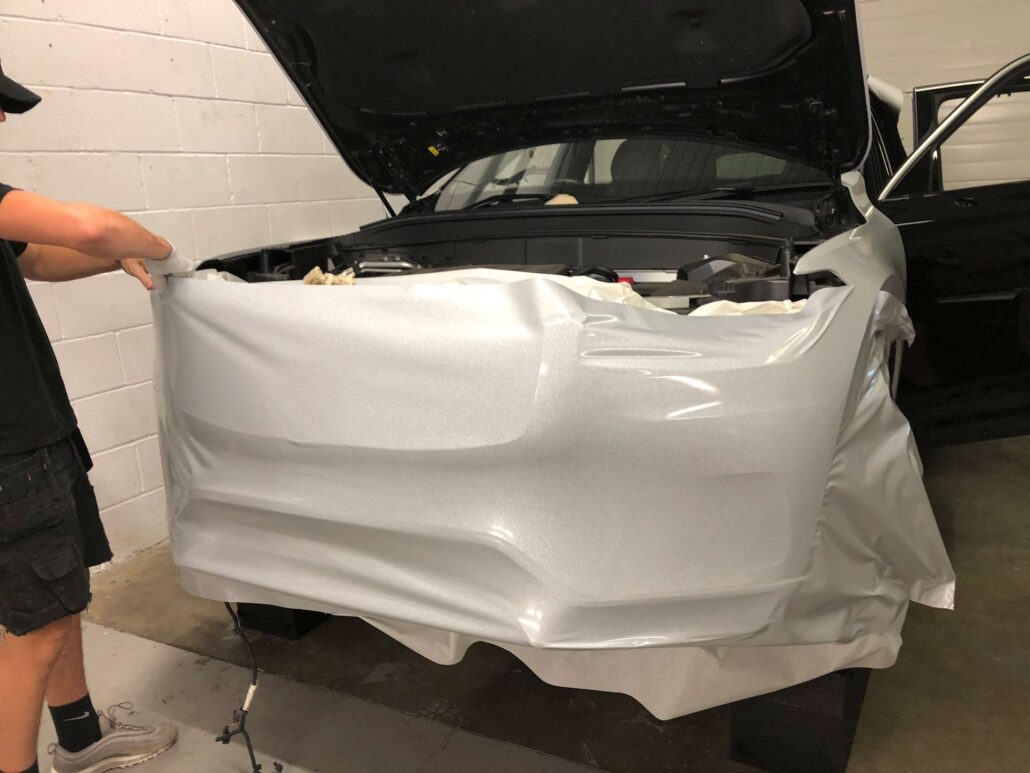 VOLVO wrap being set up for bumper
