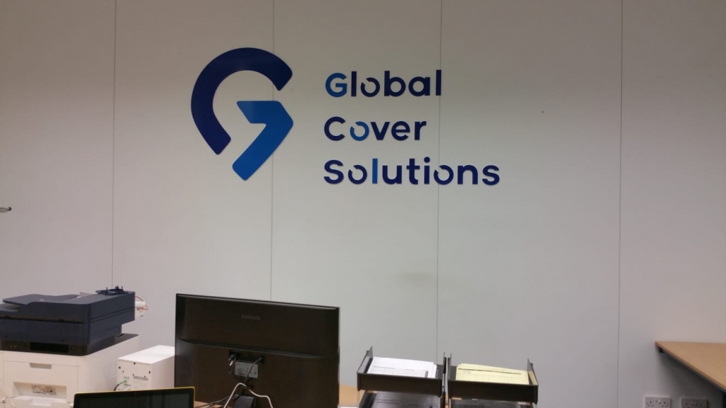 wall after adding global cover solutions interior sign