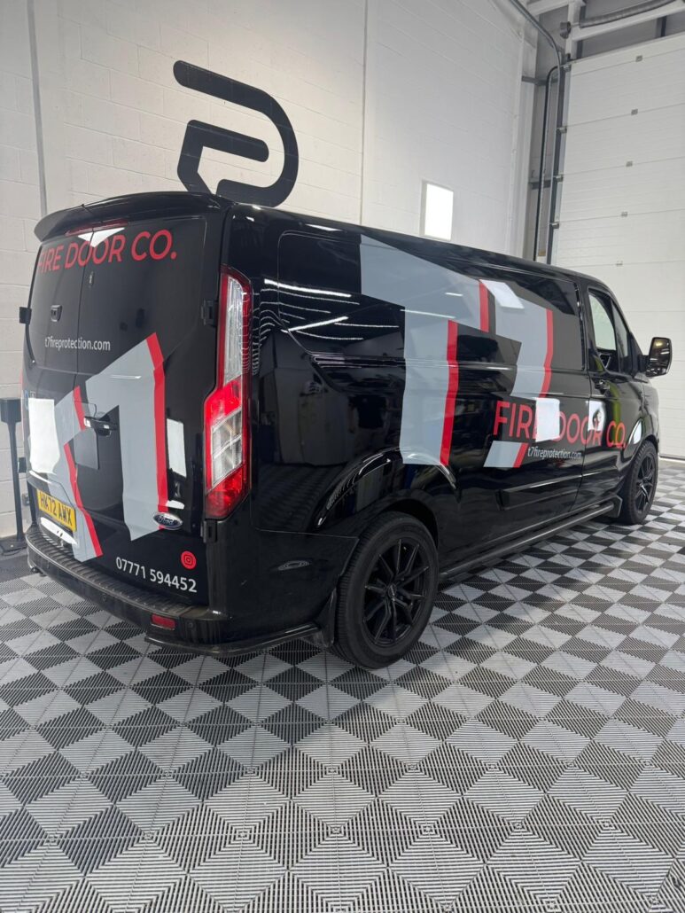 T7 Fire Doors signwriting - side rewar view - renault Traffic