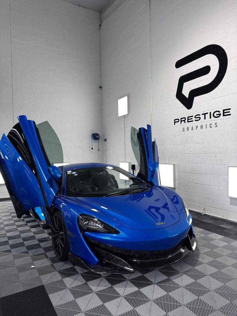 McLaren 540C Full Wrap 2 - Prestige Graphics Kent Blue Mclaren side view with open doors